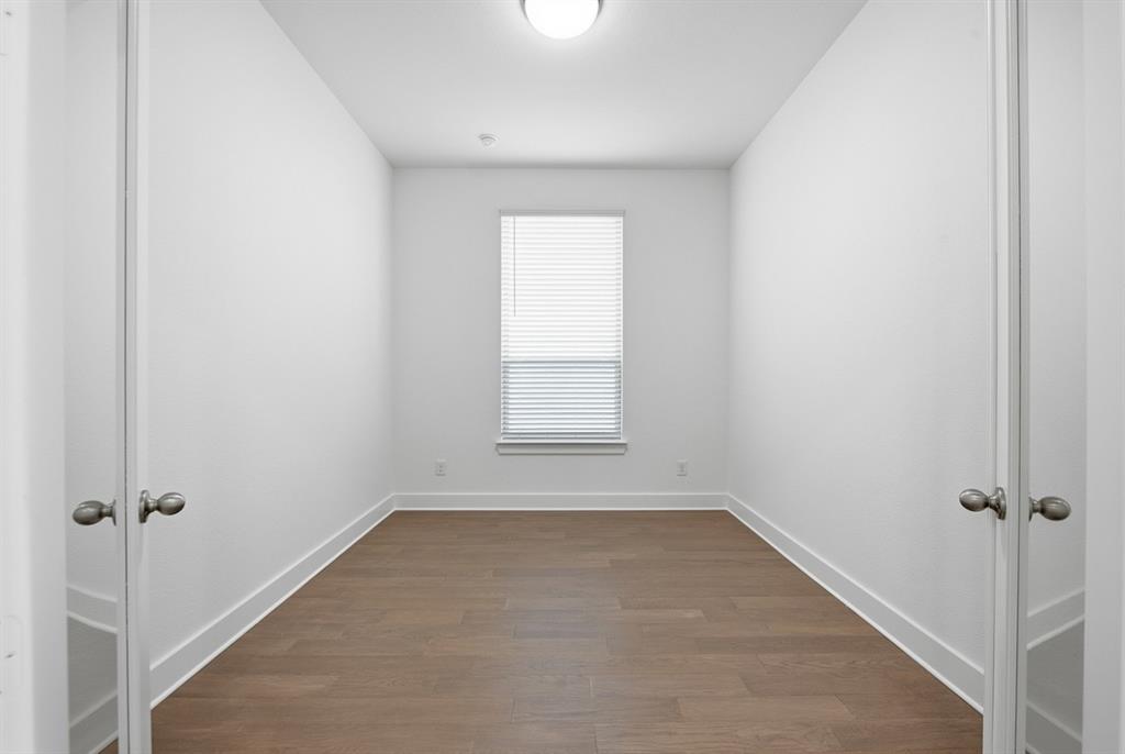 4107 Windy Point Court Oak Point, TX 75068 - Photo 16 of 30 an empty room with a window