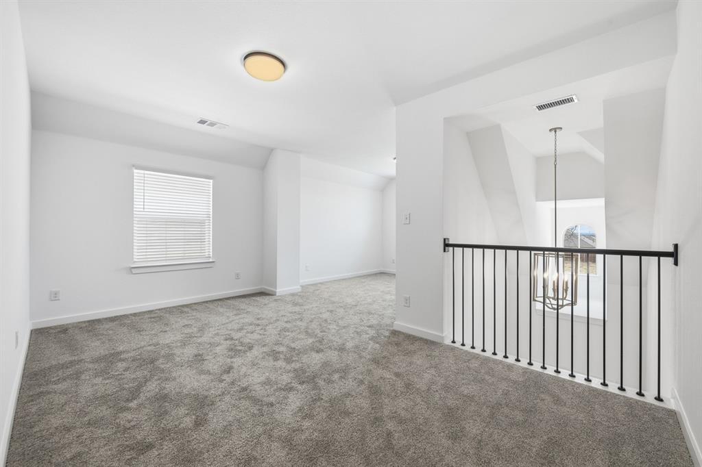 4107 Windy Point Court Oak Point, TX 75068 - Photo 23 of 30 a view of a hallway
