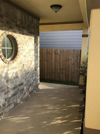 a view of a door and a window