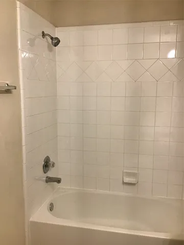 a bathroom with a bathtub