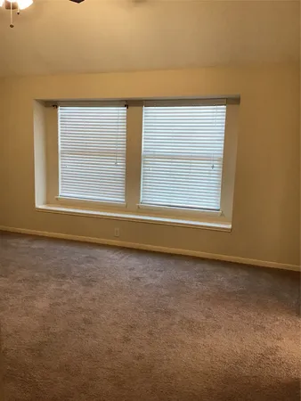 a view of a window in an empty room