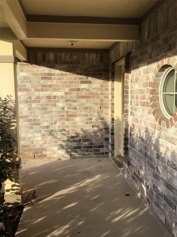 a view of a glass door shower