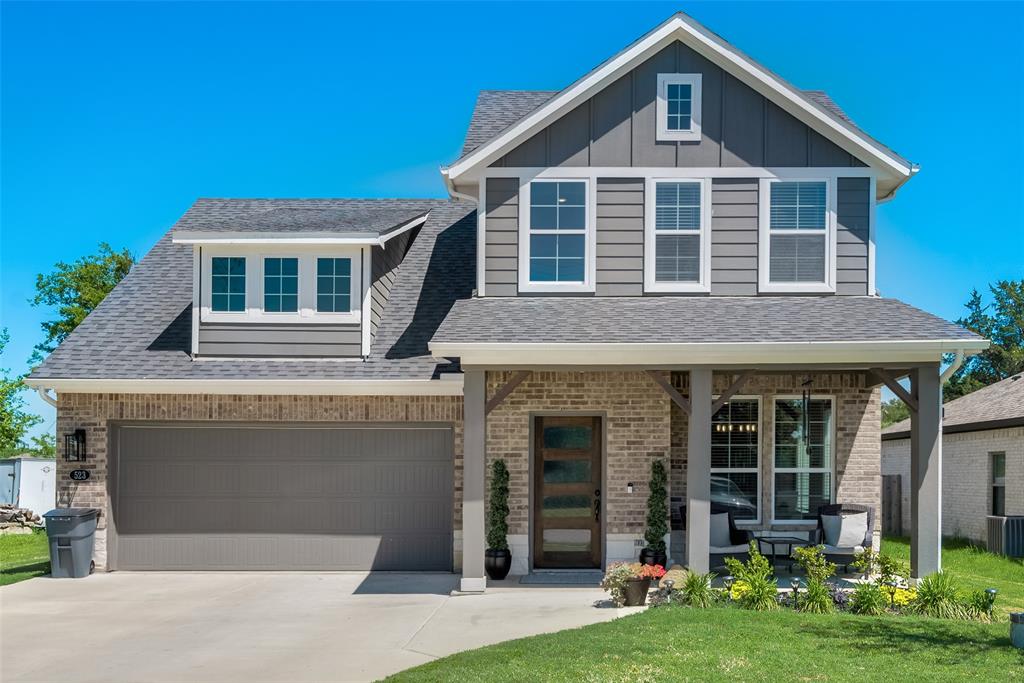 523 New Hope Street Terrell, TX 75160 - Photo 1 of 17 a front view of a house with a yard