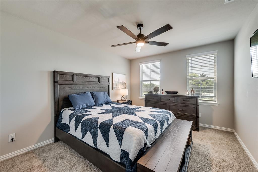 523 New Hope Street Terrell, TX 75160 - Photo 10 of 17 a bedroom with a bed and window