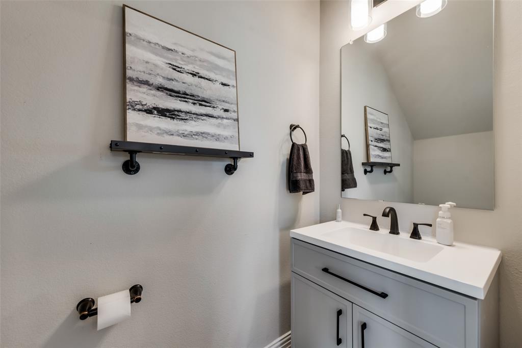 523 New Hope Street Terrell, TX 75160 - Photo 13 of 17 a bathroom with a sink and a mirror