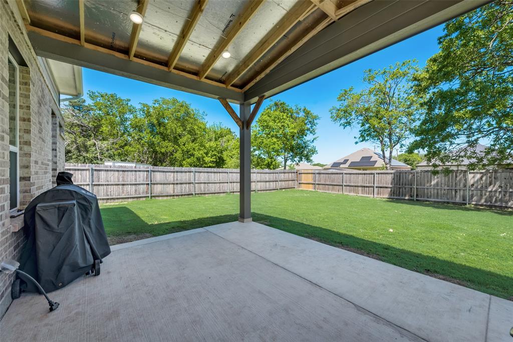523 New Hope Street Terrell, TX 75160 - Photo 14 of 17 a view of backyard with green space