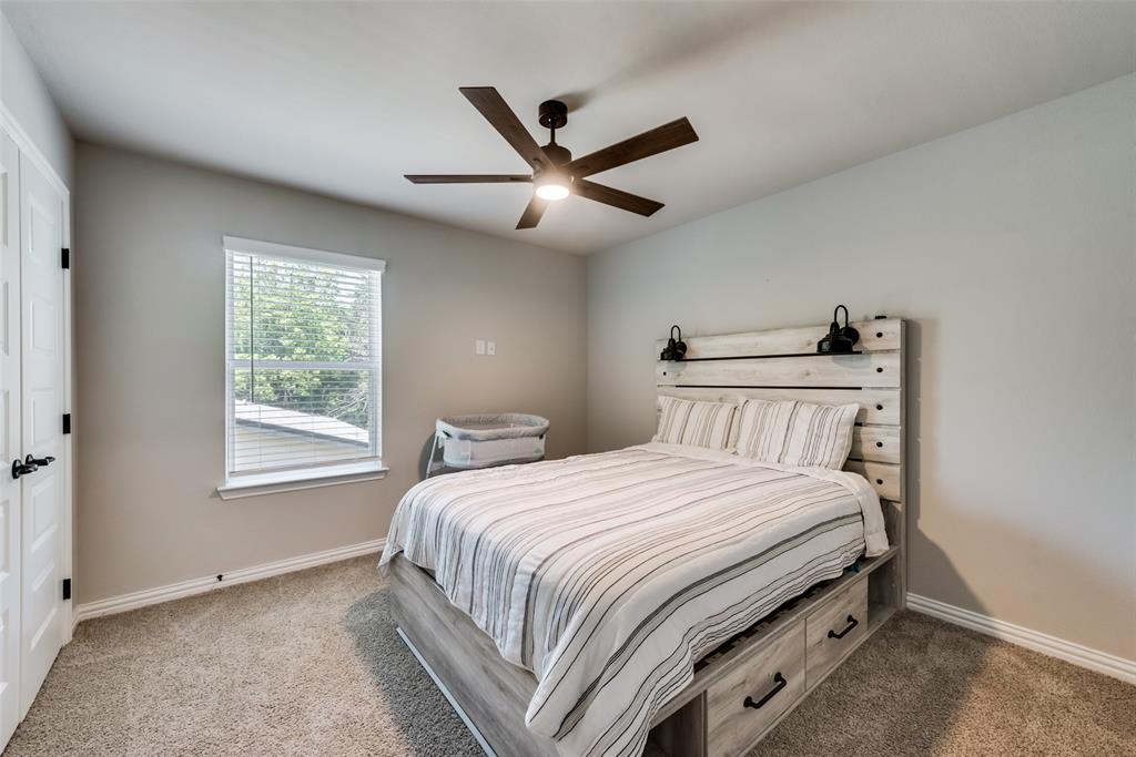 523 New Hope Street Terrell, TX 75160 - Photo 7 of 17 a bedroom with a bed and window