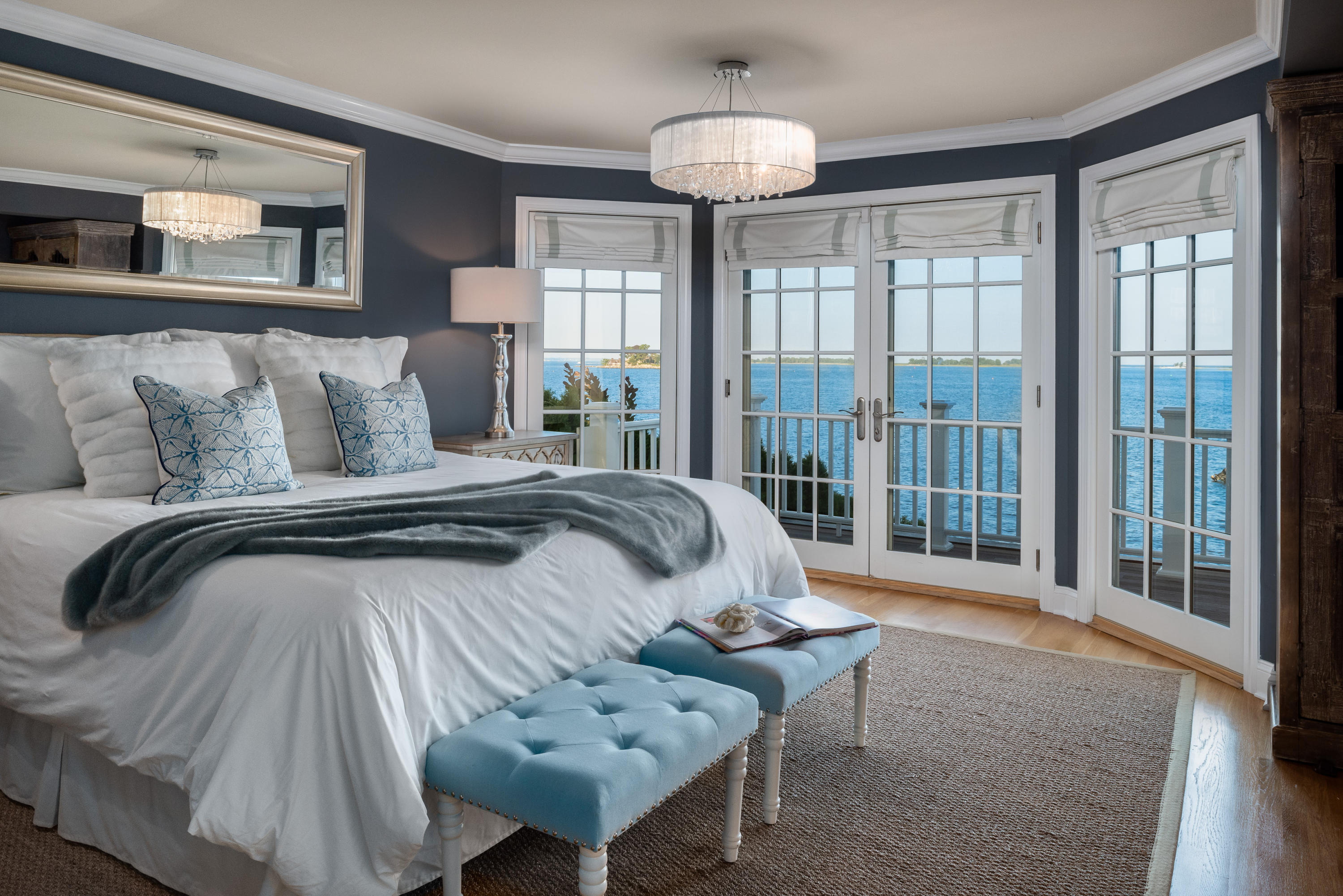 17 Rocky Point Road Rowayton, CT 06853 - Photo 11 of 25 a bedroom with a bed and glass window