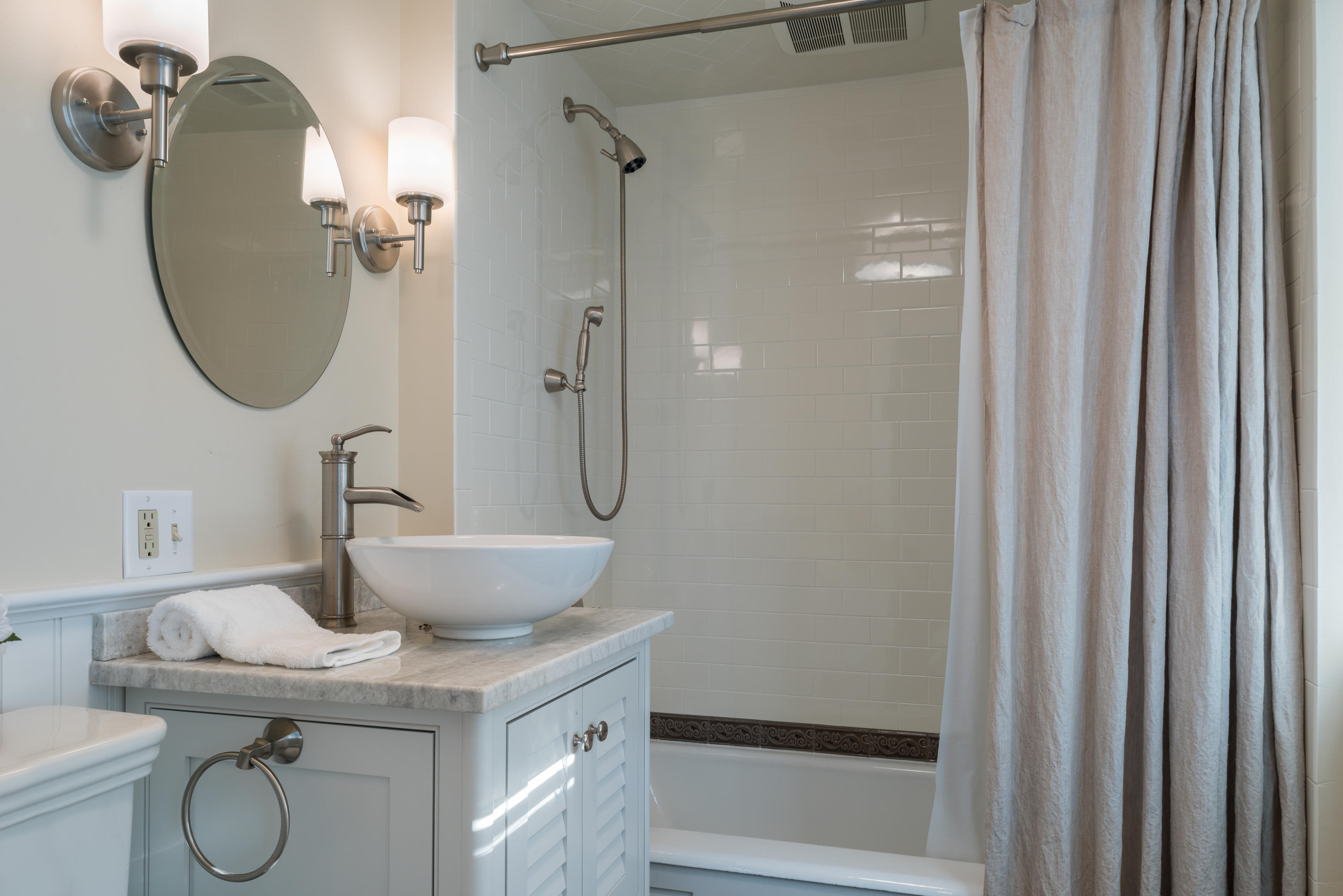 17 Rocky Point Road Rowayton, CT 06853 - Photo 17 of 25 a bathroom with a sink a toilet and shower