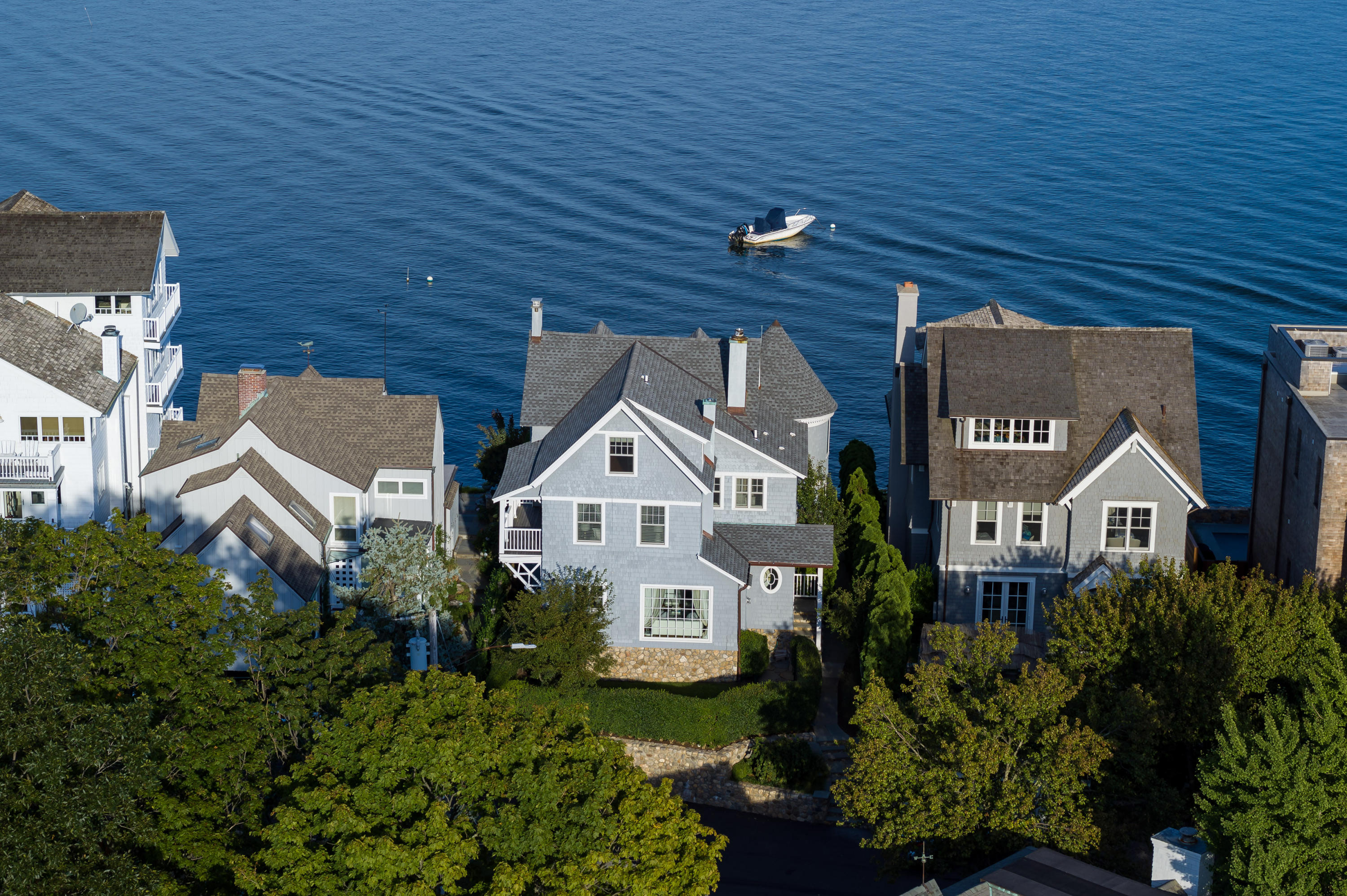 17 Rocky Point Road Rowayton, CT 06853 - Photo 2 of 25 an aerial view of a house with a yard and potted plants