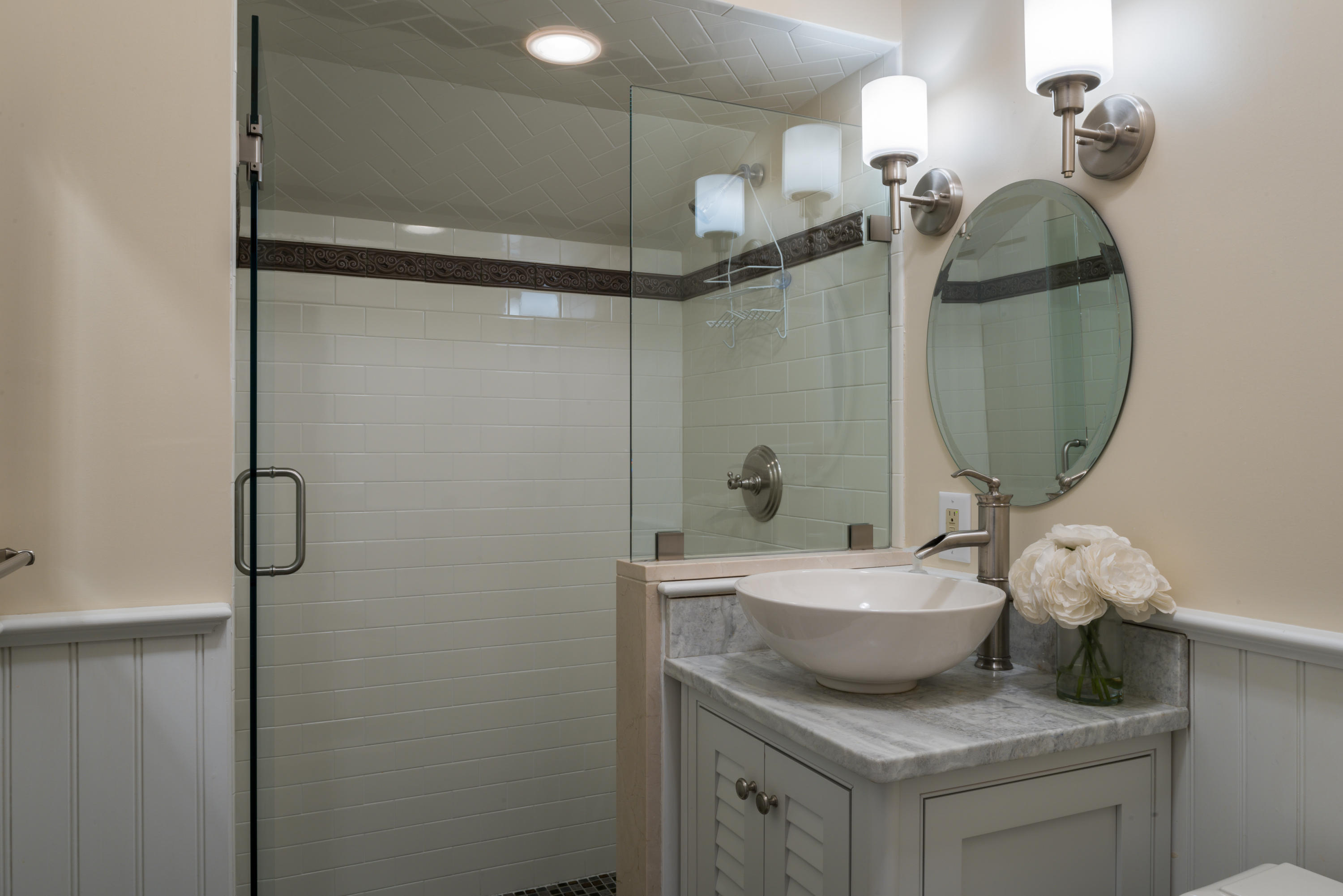 17 Rocky Point Road Rowayton, CT 06853 - Photo 21 of 25 a bathroom with a granite countertop sink a mirror and shower