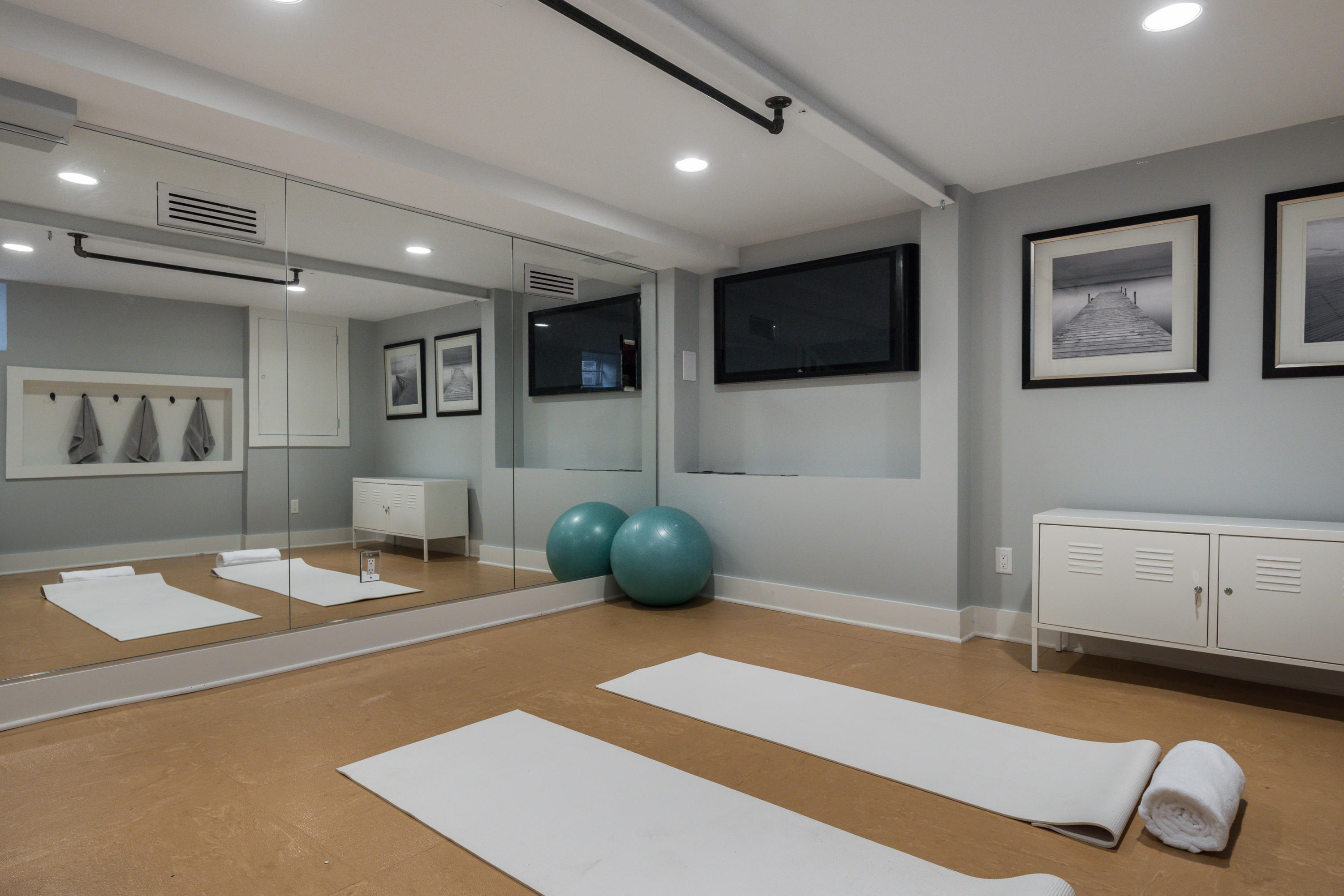 17 Rocky Point Road Rowayton, CT 06853 - Photo 22 of 25 a living room with furniture and a flat screen tv