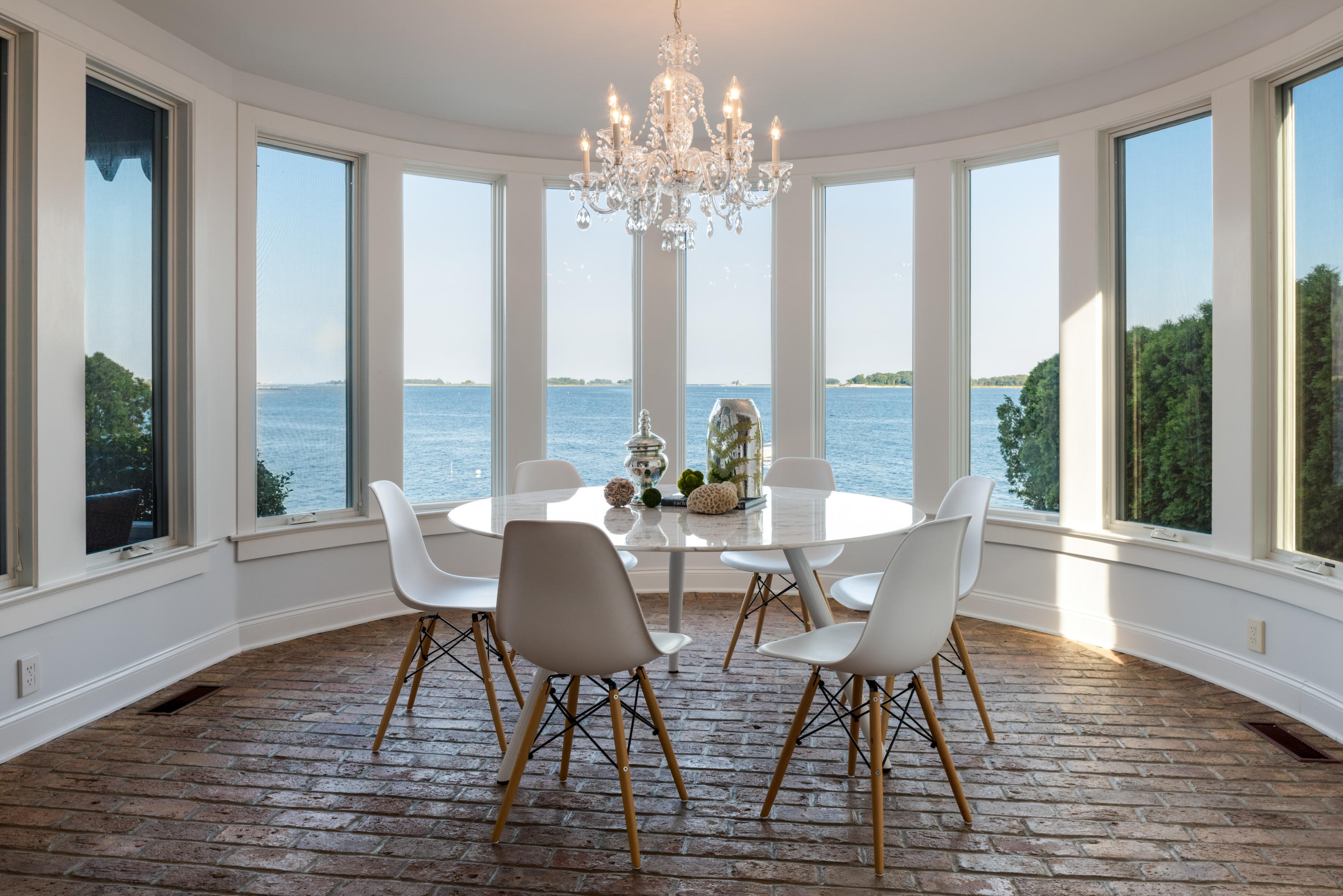 17 Rocky Point Road Rowayton, CT 06853 - Photo 4 of 25 a view of a dining room with furniture window and outside view