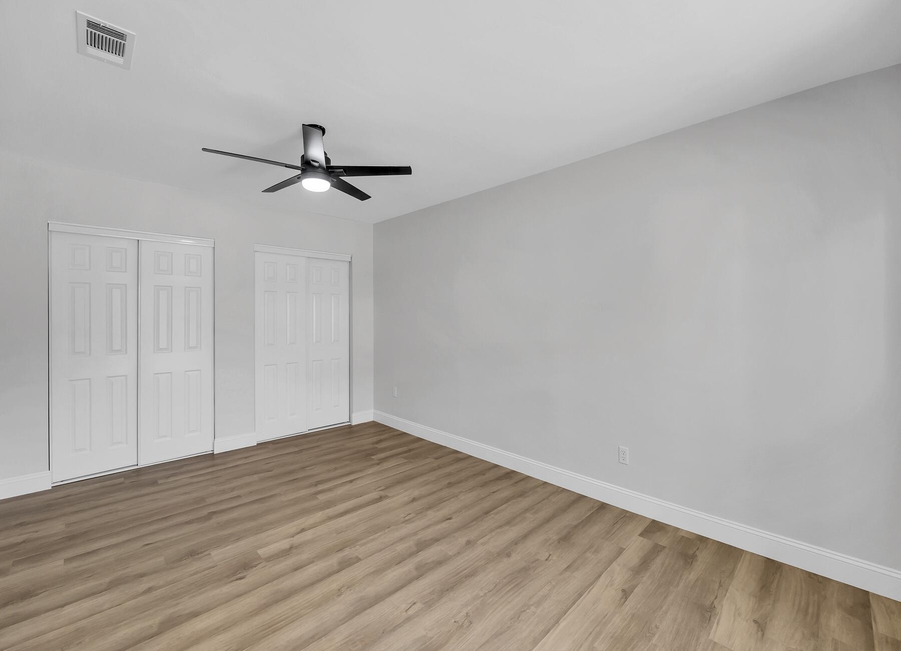 500 Ross Road Fort Walton Beach, FL 32547 - Photo 23 of 38 a view of empty room with wooden floor