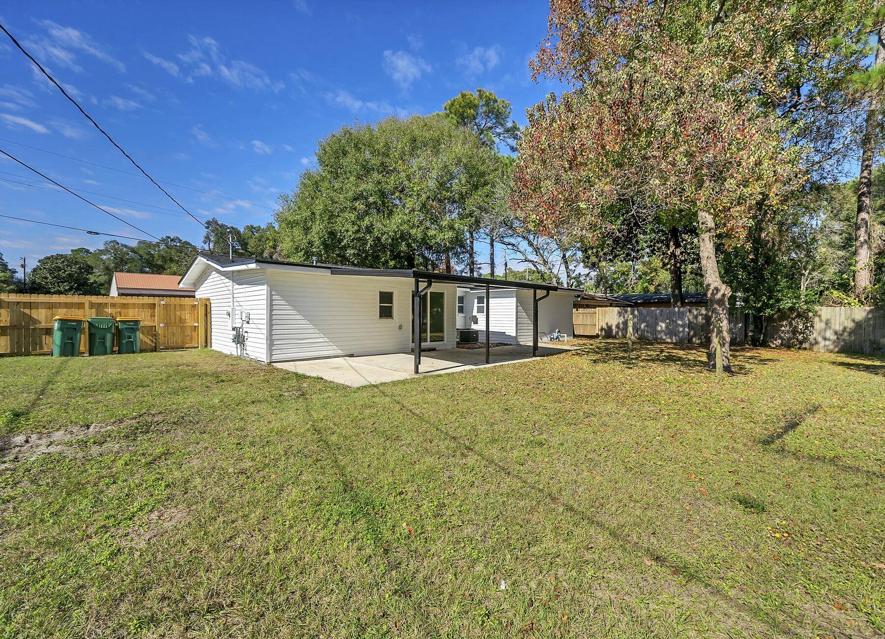 500 Ross Road Fort Walton Beach, FL 32547 - Photo 30 of 38 a view of a house with backyard and tree