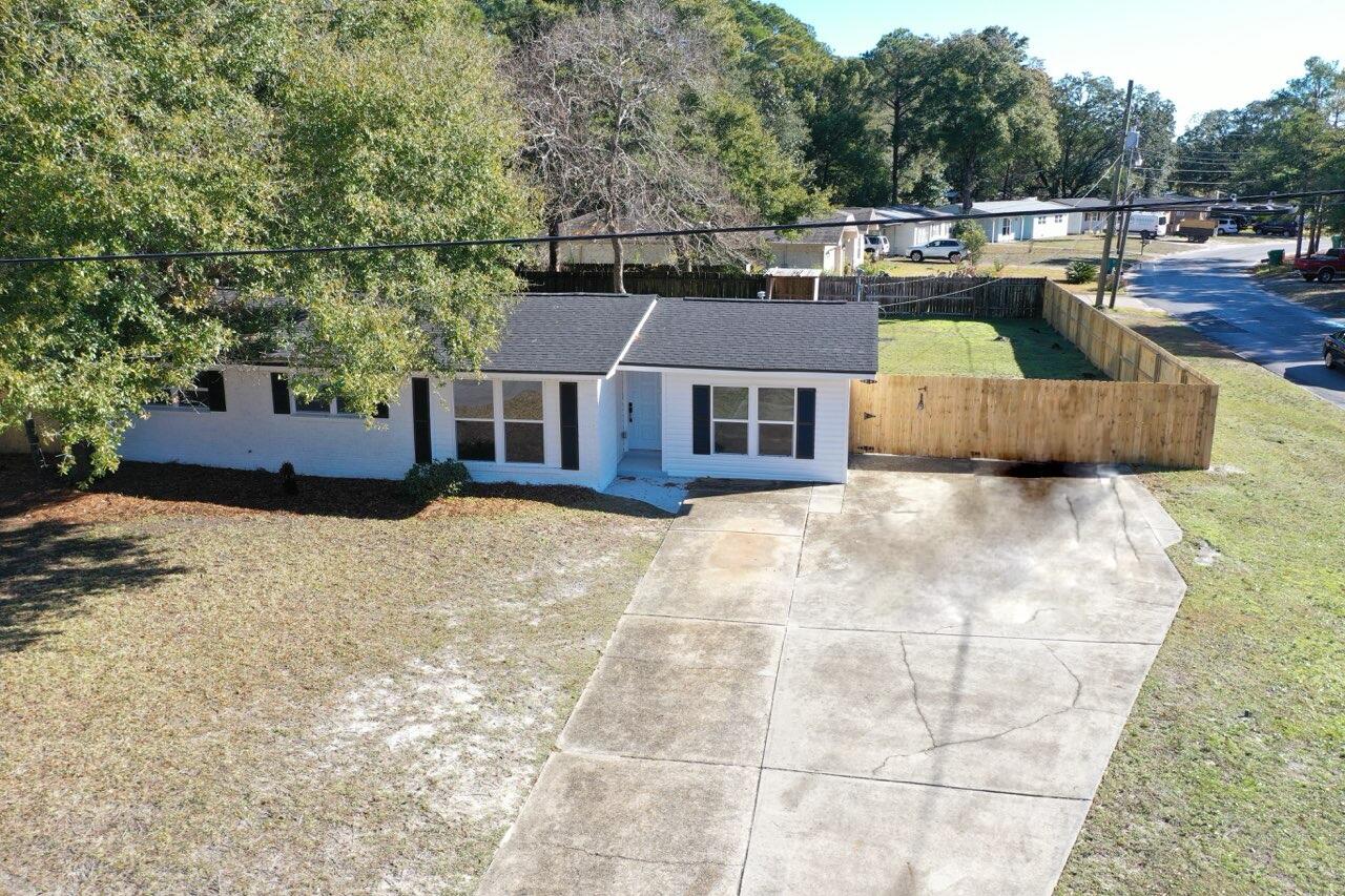 500 Ross Road Fort Walton Beach, FL 32547 - Photo 36 of 38 a view of a house with a yard