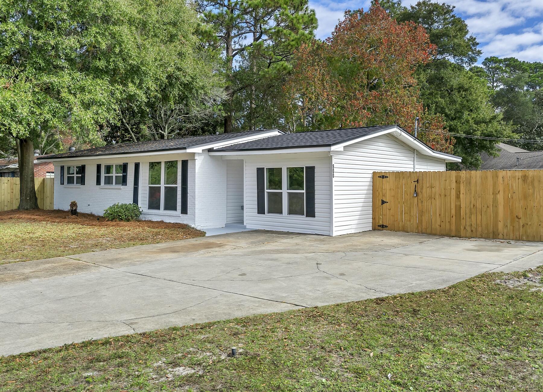 500 Ross Road Fort Walton Beach, FL 32547 - Photo 7 of 38 a house with trees in the background