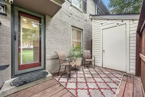 a outdoor space with a couch and chairs