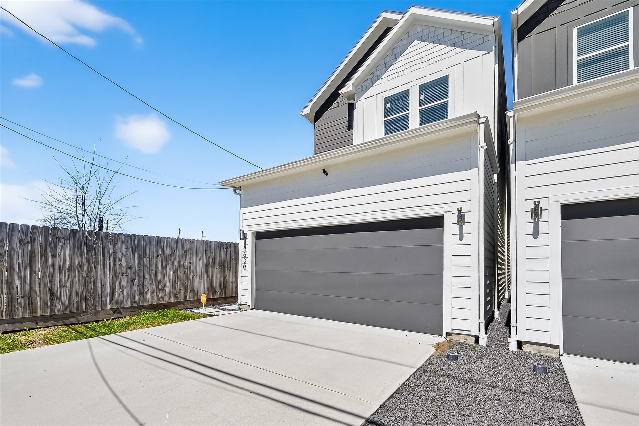 6630 Highrock Road Houston, TX 77092 - Photo 2 of 40 a front view of a house with a garage