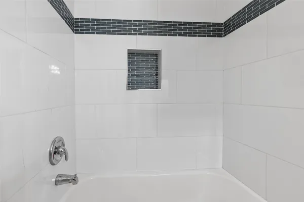 a bathroom with a bathtub