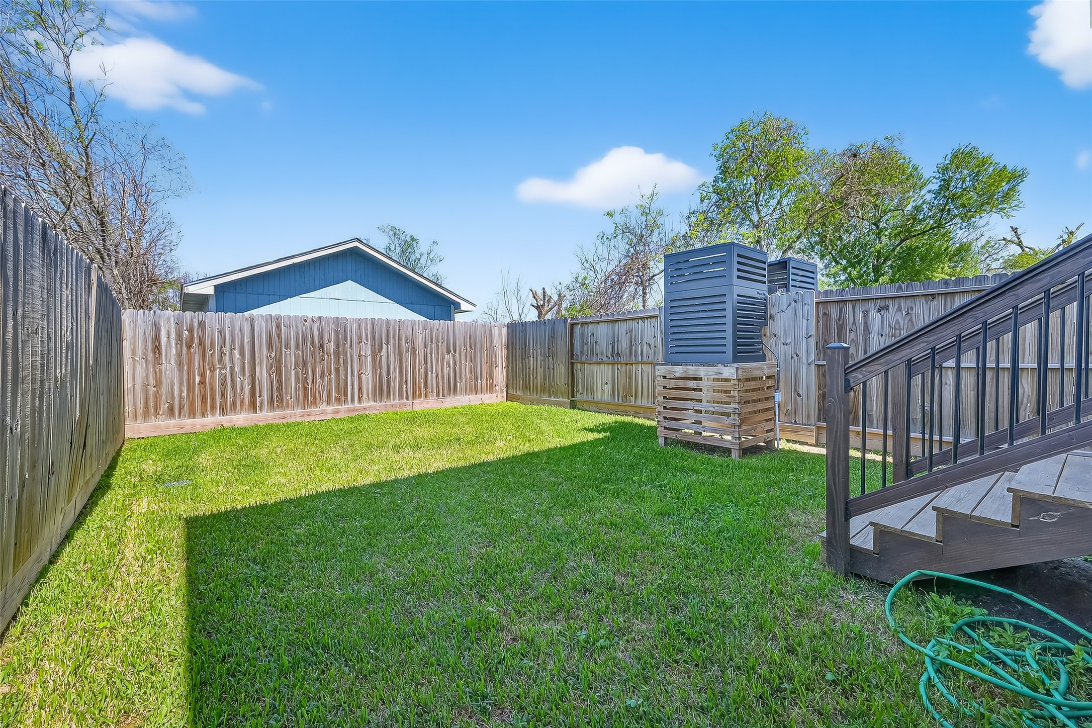 6630 Highrock Road Houston, TX 77092 - Photo 37 of 40 a view of a backyard with a garden