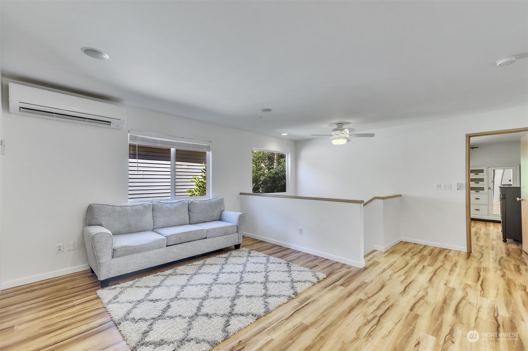 17427 92nd Avenue Northeast Bothell, WA 98011 - Photo 20 of 35 a living room with furniture and a rug