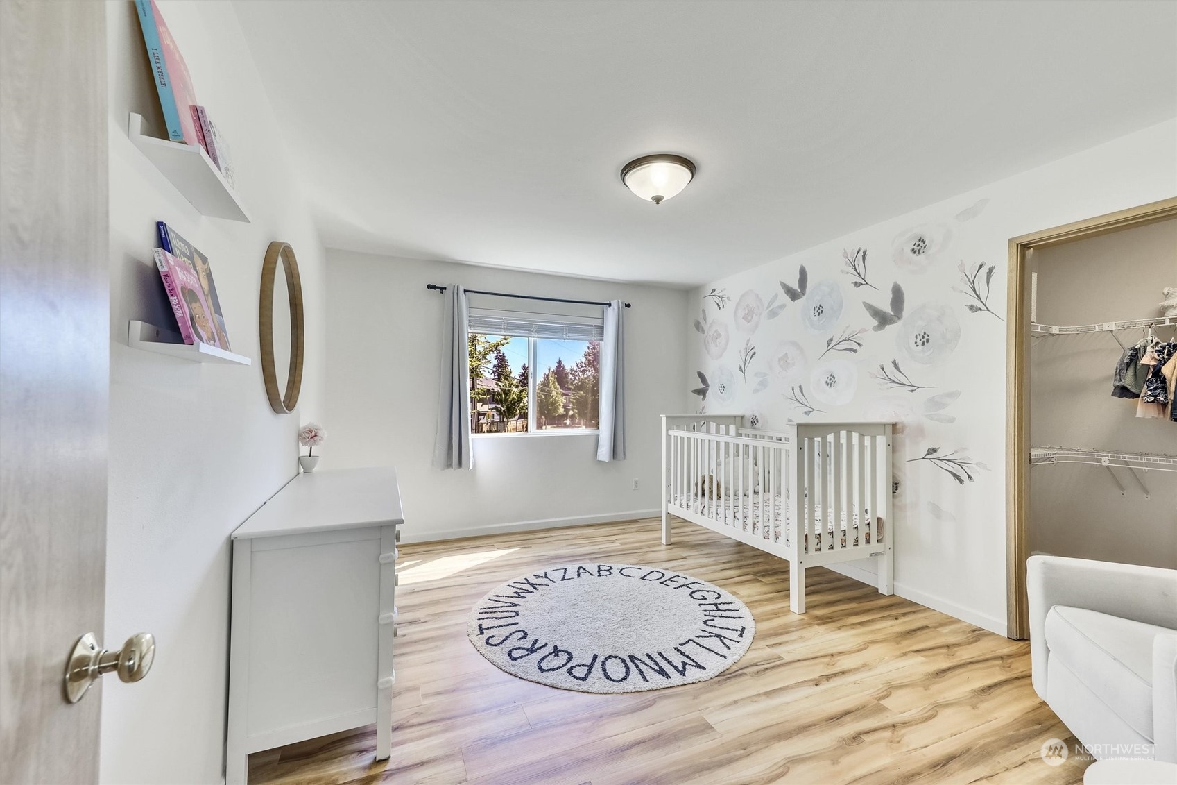 17427 92nd Avenue Northeast Bothell, WA 98011 - Photo 22 of 35 a bedroom with a bed and a window