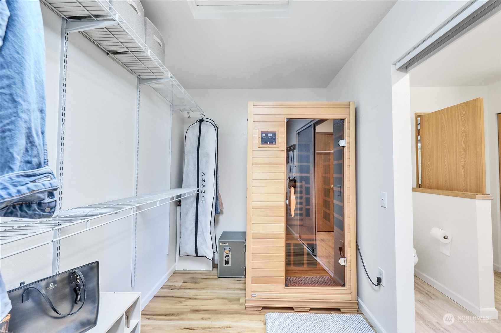 17427 92nd Avenue Northeast Bothell, WA 98011 - Photo 28 of 35 a view of a hallway with wooden floor and staircase