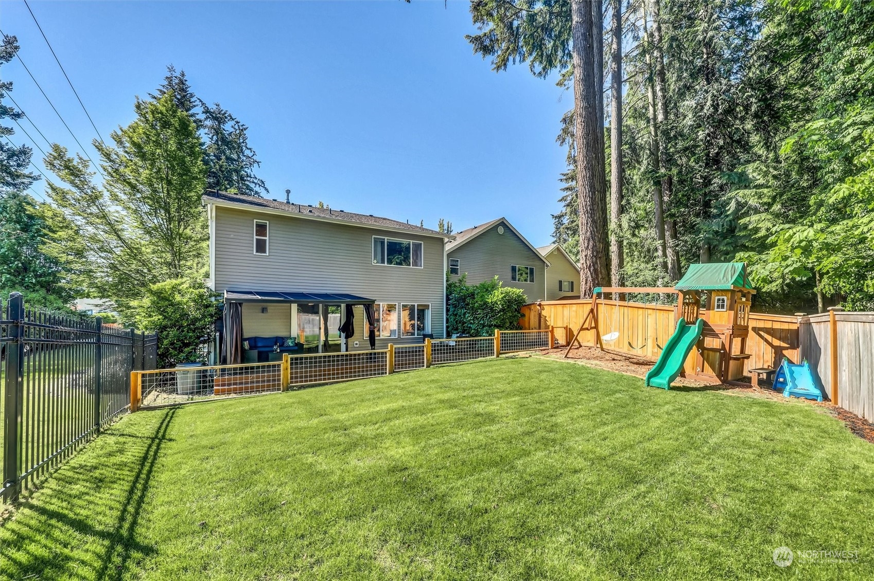 17427 92nd Avenue Northeast Bothell, WA 98011 - Photo 29 of 35 a view of a house with a yard and sitting area