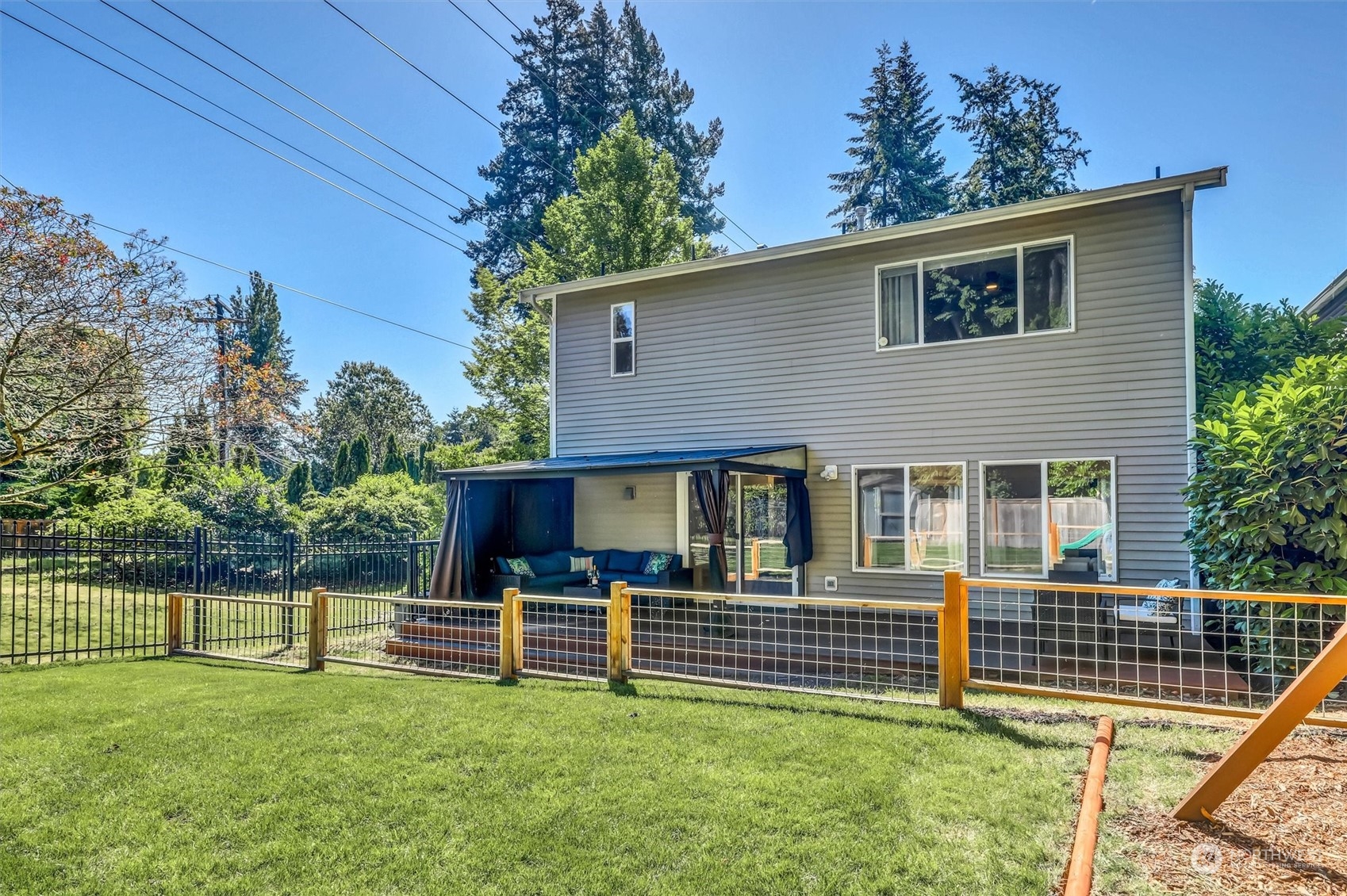 17427 92nd Avenue Northeast Bothell, WA 98011 - Photo 31 of 35 a front view of a house with a yard