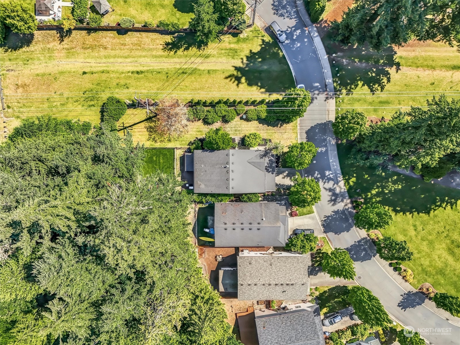 17427 92nd Avenue Northeast Bothell, WA 98011 - Photo 32 of 35 an aerial view of residential houses with outdoor space and swimming pool