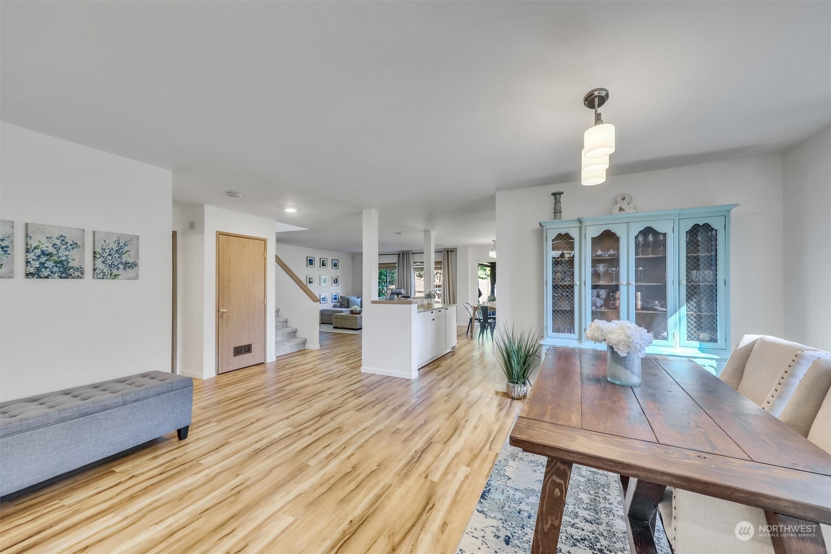 17427 92nd Avenue Northeast Bothell, WA 98011 - Photo 6 of 35 a view of a dining room with furniture window and wooden floor