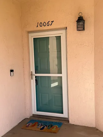 a view of a building with a yard