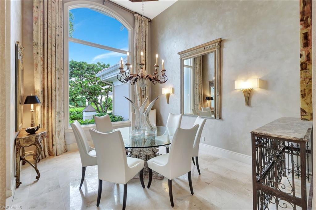 7261 Tilden Lane Naples, FL 34108 - Photo 14 of 46 a view of a dining room with furniture window and outside view