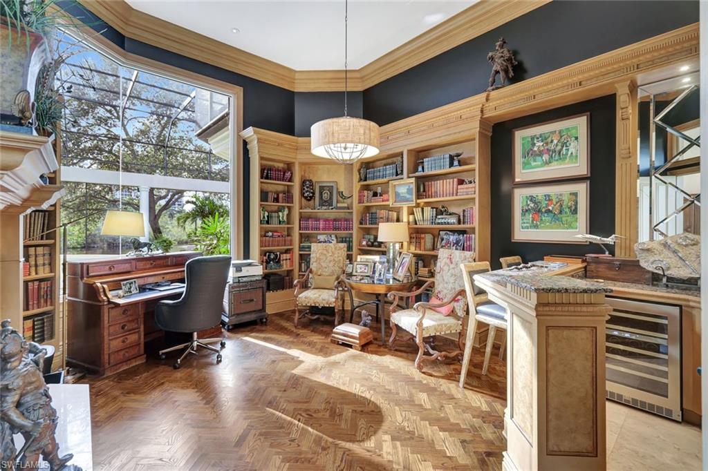 7261 Tilden Lane Naples, FL 34108 - Photo 16 of 46 a view of a chairs and table in a patio
