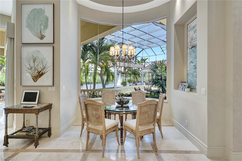 7261 Tilden Lane Naples, FL 34108 - Photo 21 of 46 a dining room with furniture and window