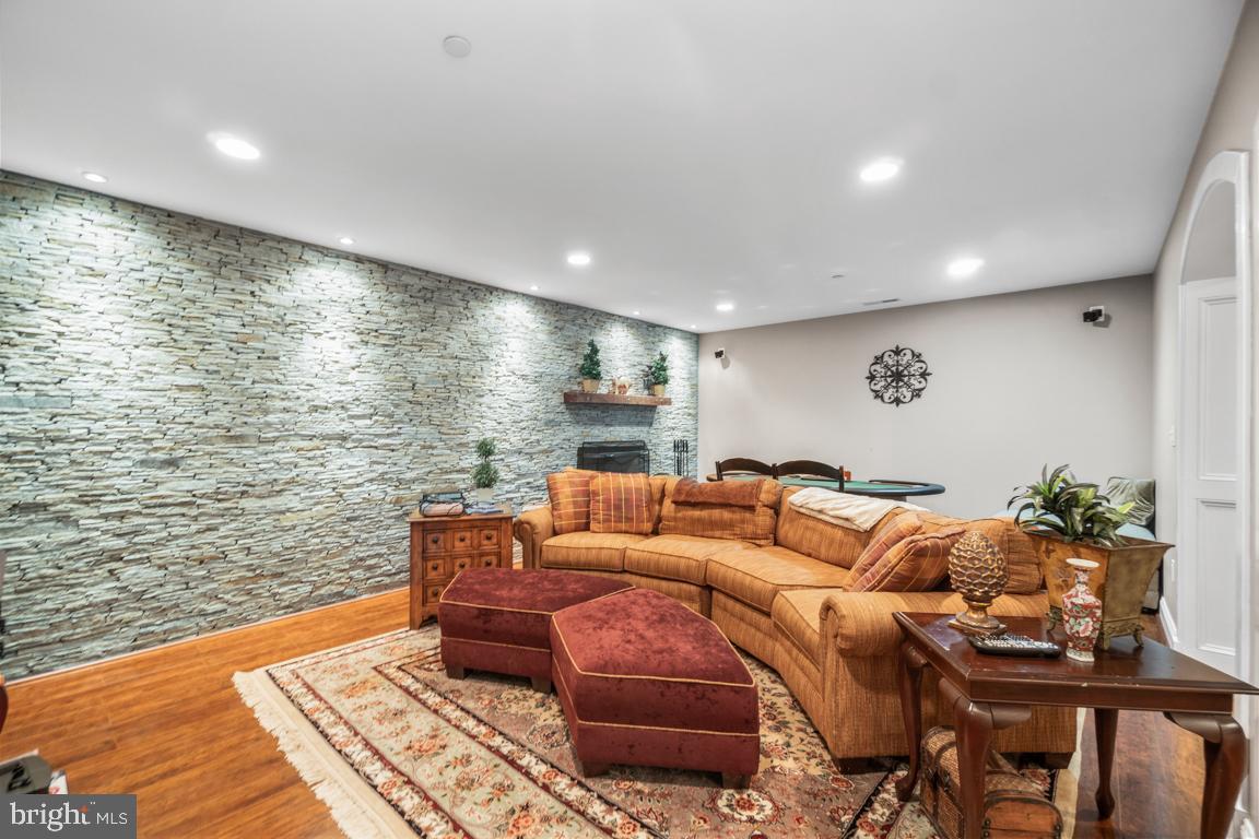 2035 Chesapeake Road Annapolis, MD 21409 - Photo 37 of 48 Lower level family room with wood fireplace