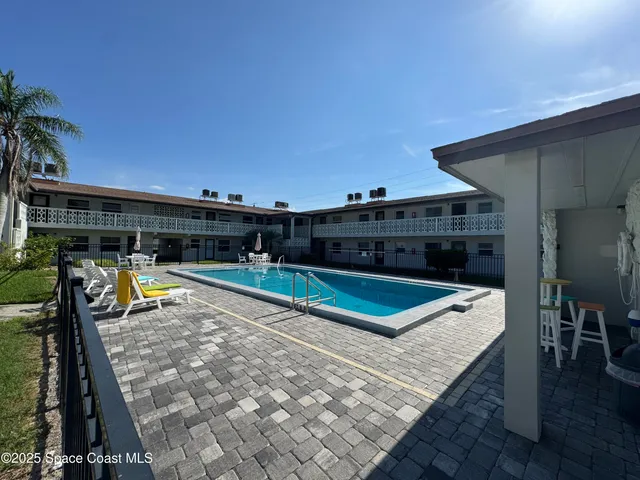 an empty room with a wooden door