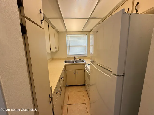 a view of a hallway to a room