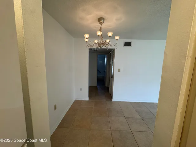 a bathroom with a sink toilet mirror and tub