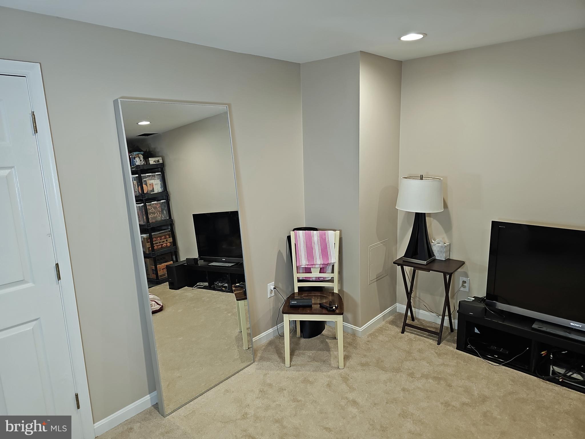 13903 Wild Raspberry Court Gainesville, VA 20155 - Photo 50 of 64 Carpeted very large storage room in Basement.