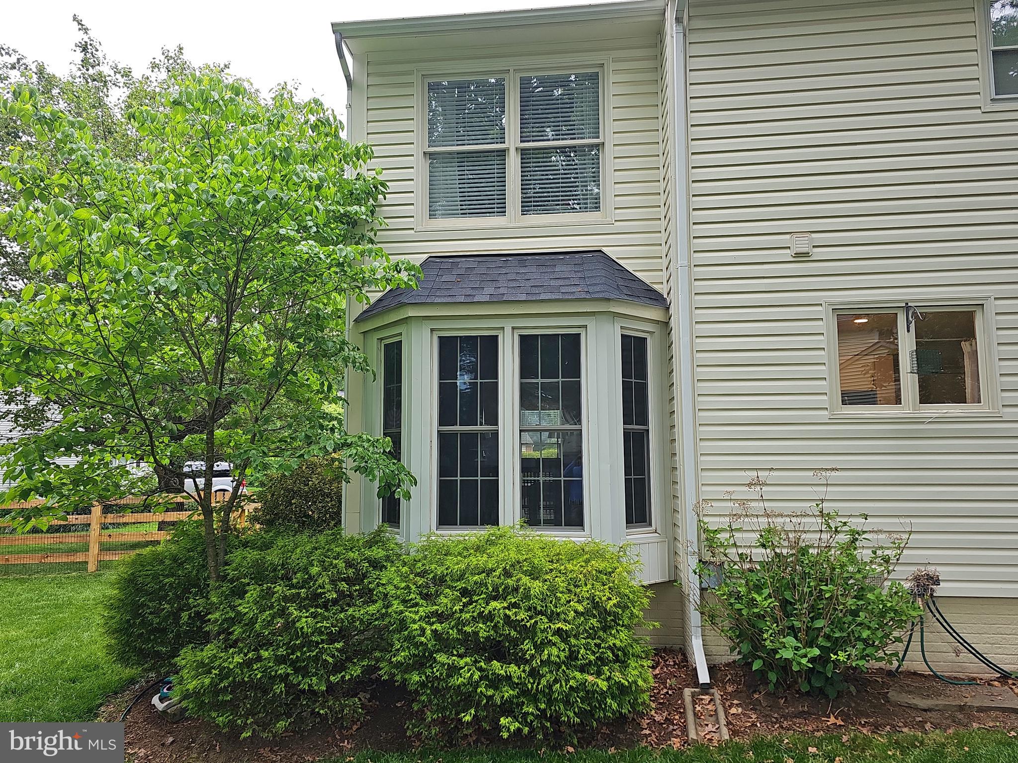 13903 Wild Raspberry Court Gainesville, VA 20155 - Photo 58 of 64 Rear of home. Great landscaping.