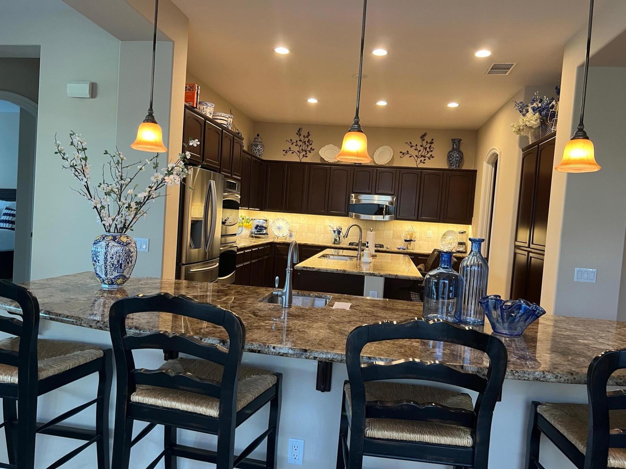 81373 Rustic Canyon Drive La Quinta, CA 92253 - Photo 5 of 61 a view of a dining room with furniture