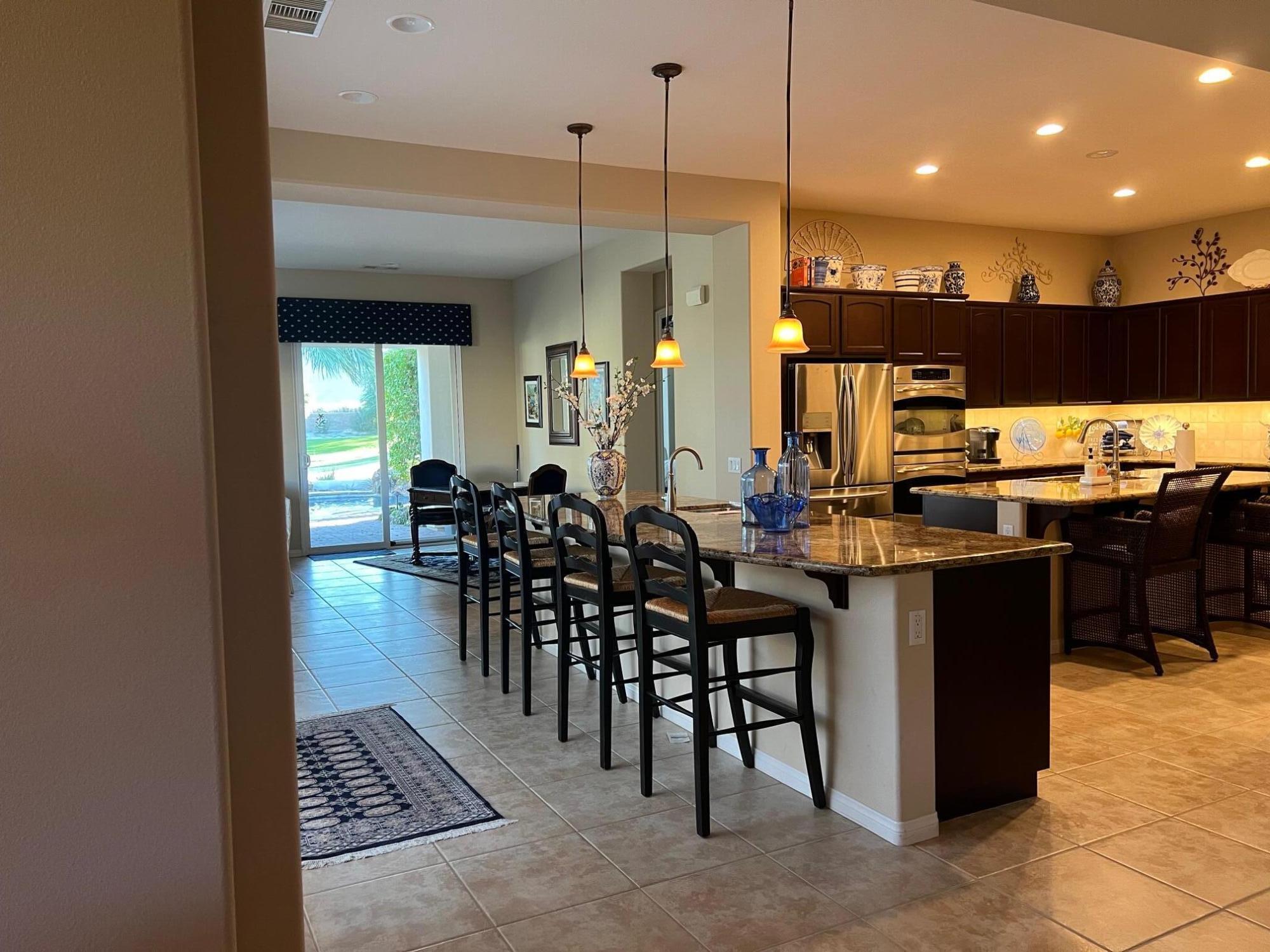 81373 Rustic Canyon Drive La Quinta, CA 92253 - Photo 6 of 61 a kitchen with lots of counter top space