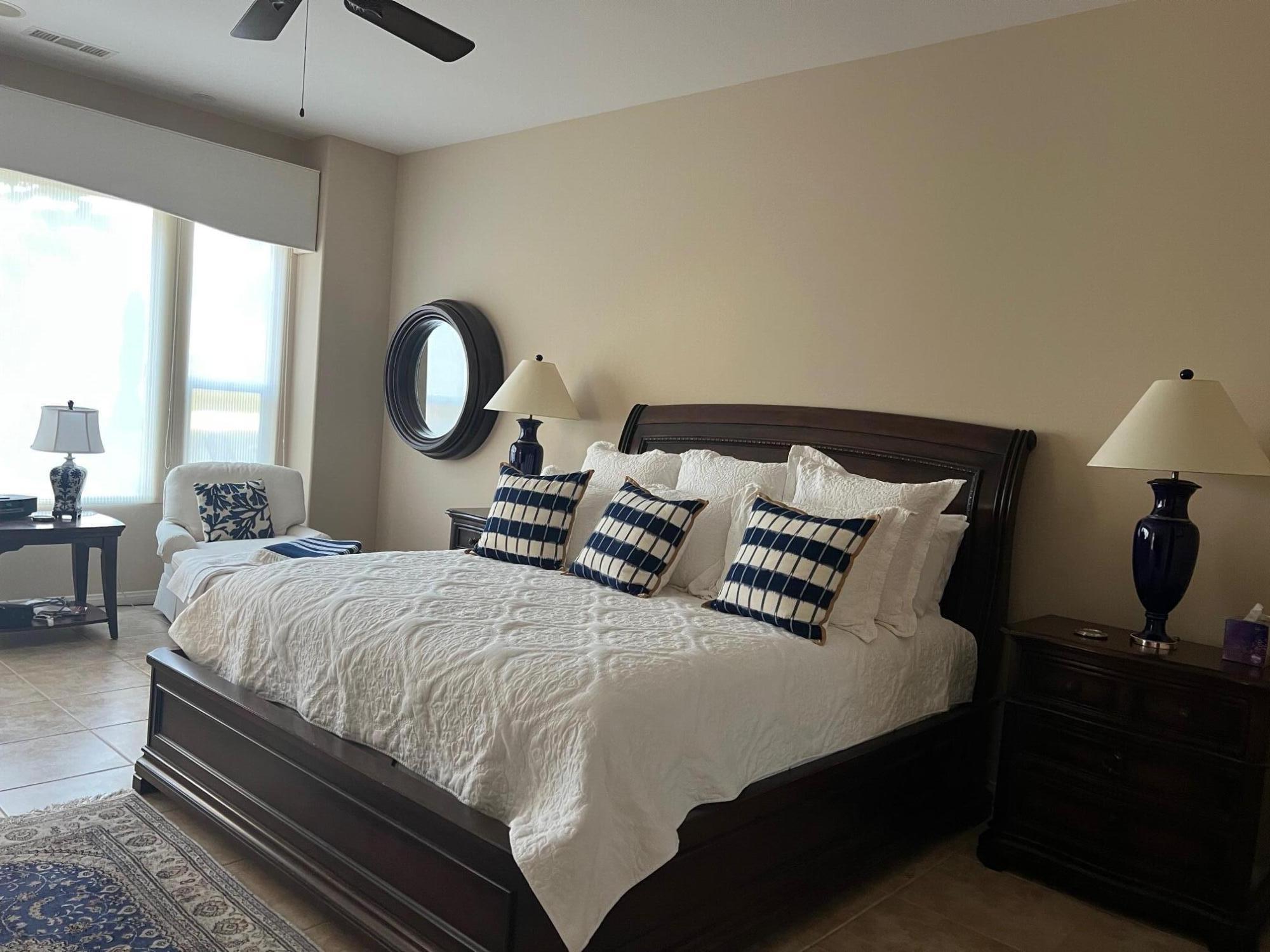 81373 Rustic Canyon Drive La Quinta, CA 92253 - Photo 8 of 61 a bedroom with bed and a window