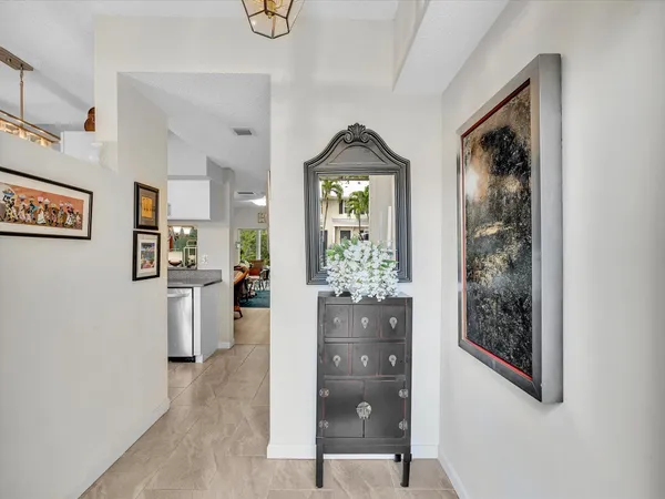 a view of a hallway view with living room