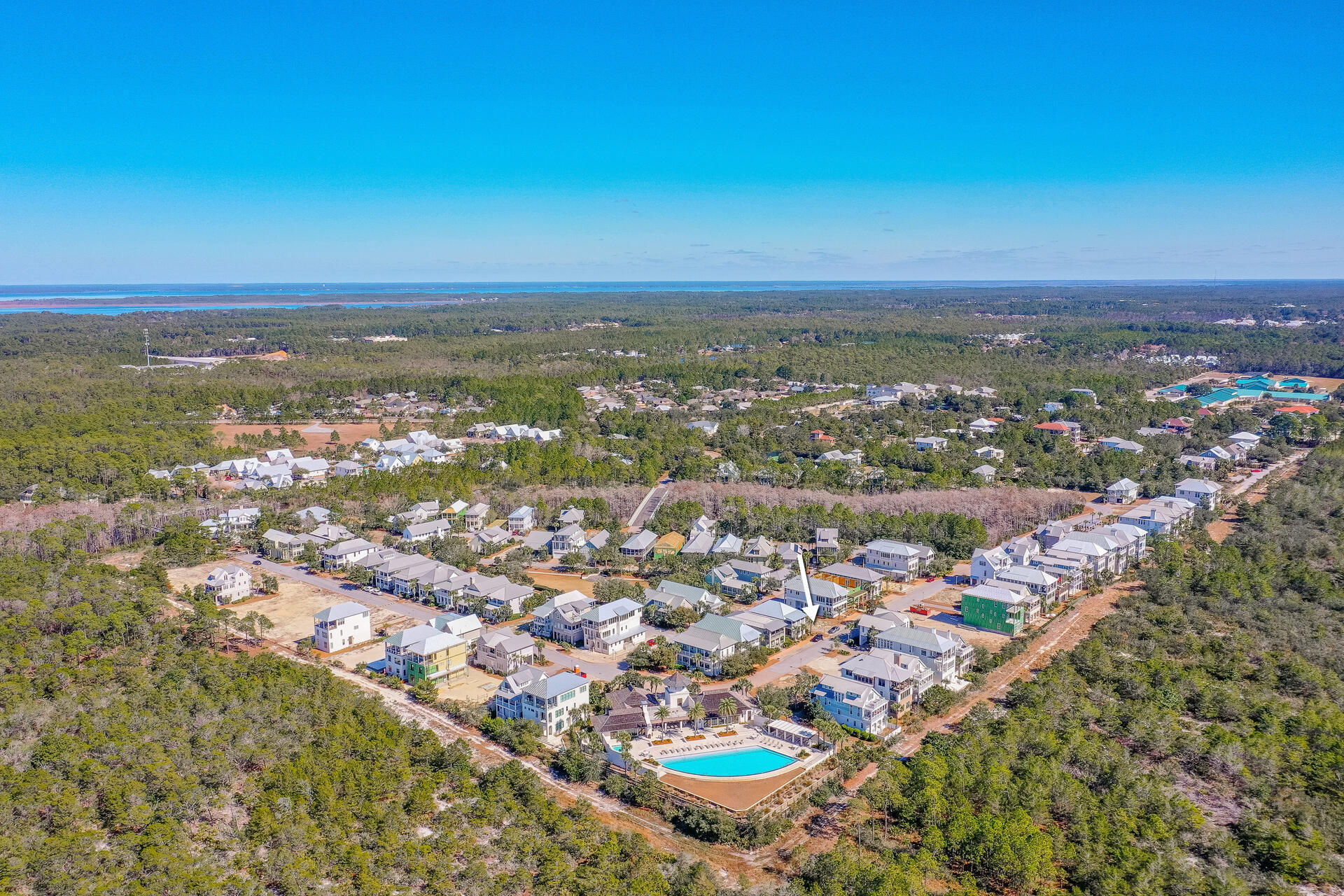 an aerial view of residential building and green space