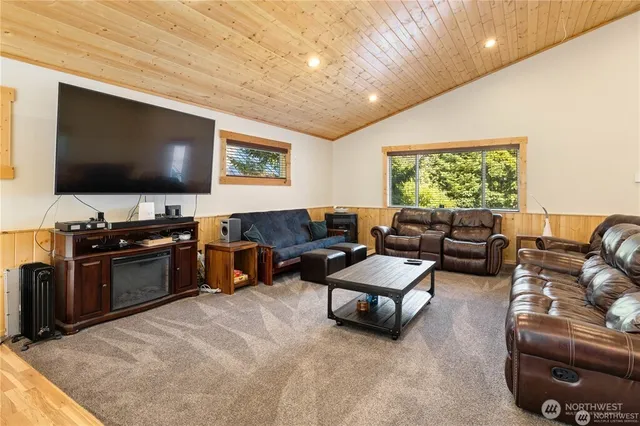 a kitchen with granite countertop a sink and a stove top oven