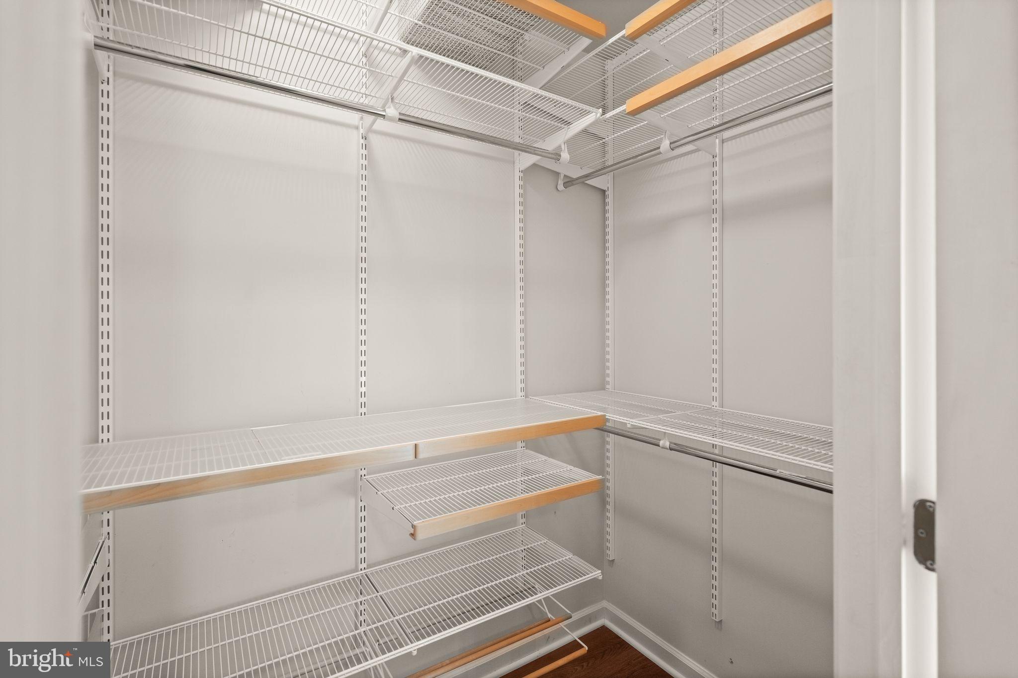 1327 Murray Downs Way Reston, VA 20194 - Photo 18 of 66 a view of an empty walk in closet