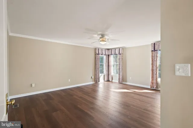 a view of a bathroom from the hallway